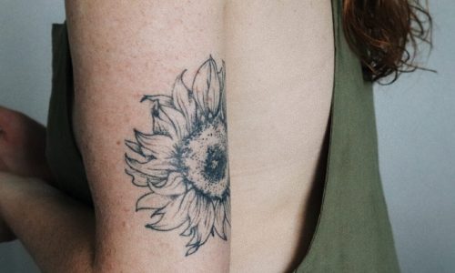 What is a tattoo and how is it created?